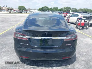 2017 Tesla Model S 100D with VIN 5YJSA1E47HF185734, listed as a IAAI auction lot 42076544 with 56,682 mi miles. Bid and sale history available at carsss.com. Image 15.