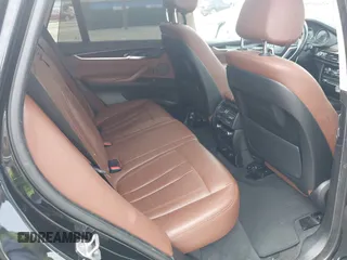 2016 BMW X5 xDrive35i z VIN 5UXKR0C55G0P26466, wystawiony jako IAAI lot #42005793 z przebiegiem 200 889 mil mil oraz . Historia ofert i sprzedaży dostępna na DreamBid. Obrazek 8.