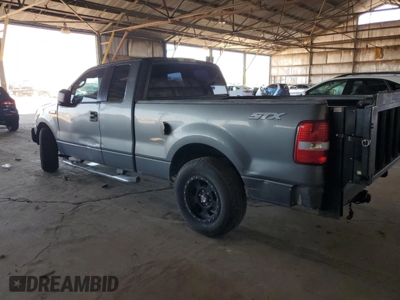 2005 Ford F-150 STX with VIN 1FTRX12W25NA37703, listed as a Copart auction lot 60089325 with 128,651 mi miles and Salvage title. Bid and sale history available at DreamBid. Image 2.
