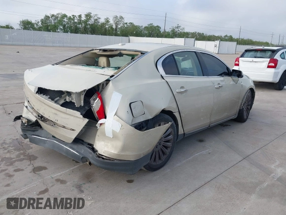 2015 Lincoln MKS with VIN 1LNHL9DKXFG607951, listed as a IAAI auction lot 40807752 with 207,097 mi miles. Bid and sale history available at carsss.com. Image 4.