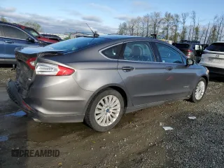 2013 Ford Fusion SE Hybrid with VIN 3FA6P0LU8DR184555, listed as a Copart auction lot 52108905 with 80,505 mi miles and Salvage Title. Bid and sale history available at DreamBid. Image 3.