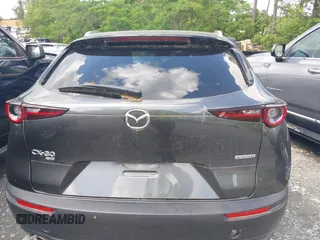 2023 Mazda CX-30 S Premium with VIN 3MVDMBDM2PM526974, listed as a IAAI auction lot 42155416 with 22,428 mi miles and . Bid and sale history available at carsss.com. Image 16.