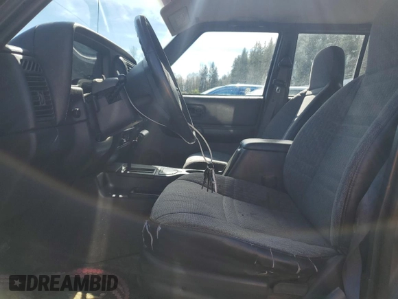 1999 Jeep Cherokee Sport с VIN 1J4FT68S3XL577599, выставлен на аукционе Copart как лот 50081715 с пробегом 182 974 миль миль и Чистый • Clean title. История ставок и продаж доступна на DreamBid. Изображение 7.