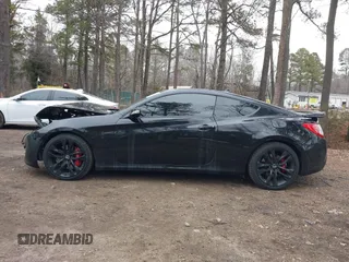 2012 Hyundai Genesis Coupe Grand Touring z VIN KMHHU6KH3CU068055, wystawiony jako IAAI lot #41359683 z przebiegiem 114 423 mil mil oraz . Historia ofert i sprzedaży dostępna na DreamBid. Obrazek 14.