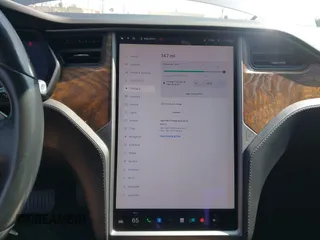 2019 Tesla Model S 75D with VIN 5YJSA1E25KF304371, listed as a IAAI auction lot 42349856 with 64,788 mi miles and . Bid and sale history available at DreamBid. Image 18.