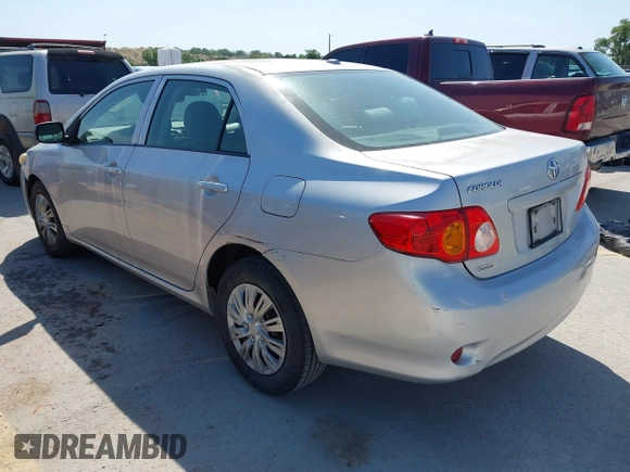 2009 Toyota Corolla with VIN 1NXBU40E79Z134599, listed as a IAAI auction lot 42035077 with 154,051 mi miles. Bid and sale history available at carsss.com. Image 3.