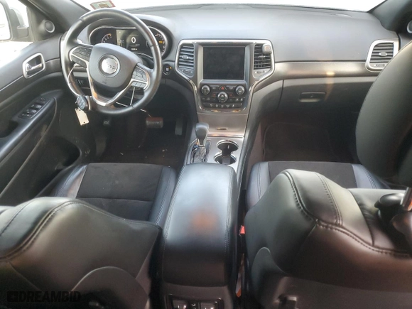 2018 Jeep Grand Cherokee Laredo E with VIN 1C4RJFAG7JC457083, listed as a Copart auction lot 85923624 with 101,952 mi miles and Salvage Title. Bid and sale history available at carsss.com. Image 8.