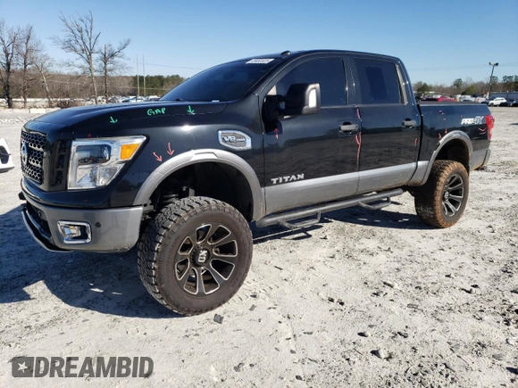 2017 Nissan Titan SV with VIN 1N6AA1E56HN541674, listed as a Copart auction lot 49463325 with 114,520 mi miles and Salvage Title. Bid and sale history available at DreamBid. Image 1.