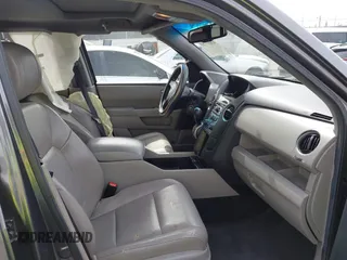 2012 Honda Pilot EX-L with VIN 5FNYF3H55CB039448, listed as a IAAI auction lot 41657753 with 168,647 mi miles. Bid and sale history available at carsss.com. Image 5.