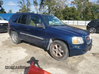 2004 GMC Envoy SLT with VIN 1GKDS13S042311327, listed as a Copart auction lot 42736995 with 235,164 mi miles and Salvage Title. Bid and sale history available at carsss.com. Image 4.