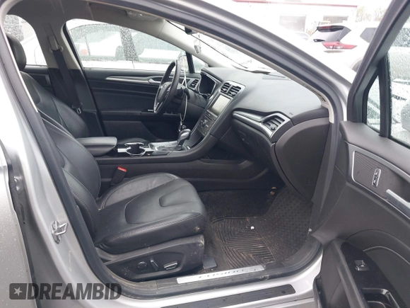 2016 Ford Fusion Titanium with VIN 3FA6P0K91GR360914, listed as a IAAI auction lot 41833665 with 107,367 mi miles and . Bid and sale history available at DreamBid. Image 5.