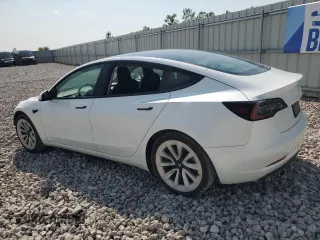 2023 Tesla Model 3 with VIN 5YJ3E1EA8PF449797, listed as a Copart auction lot 64601115 with 99,771 mi miles and Clean title. Bid and sale history available at DreamBid. Image 2.