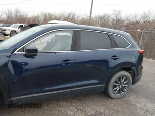 2021 Mazda CX-9 Touring z VIN JM3TCBCY4M0520362, wystawiony jako IAAI lot #41193396 z przebiegiem 17 323 mil mil oraz . Historia ofert i sprzedaży dostępna na DreamBid. Obrazek 14.