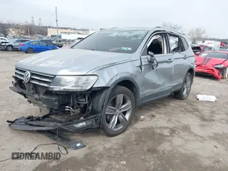 2020 Volkswagen Tiguan SE with VIN 3VV2B7AX6LM026760, listed as a IAAI auction lot 41652292 with 63,925 mi miles and . Bid and sale history available at DreamBid. Image 16.