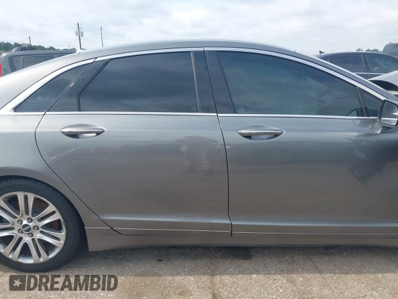 2014 Lincoln MKZ z VIN 3LN6L2GK3ER807586, wystawiony jako IAAI lot #42426125 z przebiegiem 198 281 mil mil oraz . Historia ofert i sprzedaży dostępna na DreamBid. Obrazek 12.