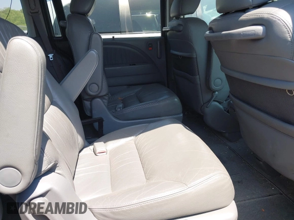 2007 Honda Odyssey EX-L z VIN 5FNRL38667B453060, wystawiony jako IAAI lot #42066637 z przebiegiem 184 439 mil mil oraz . Historia ofert i sprzedaży dostępna na DreamBid. Obrazek 8.