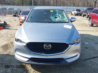 2020 Mazda CX-5 Touring with VIN JM3KFACM8L0727393, listed as a IAAI auction lot 41492627 with 91,521 mi miles. Bid and sale history available at carsss.com. Image 12.