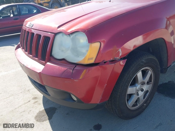 2010 Jeep Grand Cherokee Laredo with VIN 1J4PS4GK4AC121454, listed as a IAAI auction lot 41759966 with 69,390 mi miles. Bid and sale history available at carsss.com. Image 6.