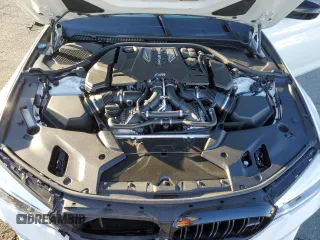 2020 BMW M5 Competition z VIN WBSJF0C02LCE07069, wystawiony jako Copart lot #66175502 z przebiegiem 28 945 mil mil oraz . Historia ofert i sprzedaży dostępna na DreamBid. Obrazek 7.