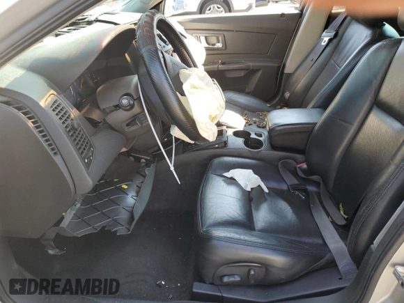 2004 Cadillac CTS with VIN 1G6DM577540183538, listed as a Copart auction lot 70317994 with 104,247 mi miles and Salvage Title. Bid and sale history available at carsss.com. Image 7.