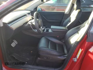 2022 Tesla Model Y Performance with VIN 7SAYGDEF2NF323142, listed as a Copart auction lot 48218235 with 43,524 mi miles and Salvage Title. Bid and sale history available at DreamBid. Image 7.