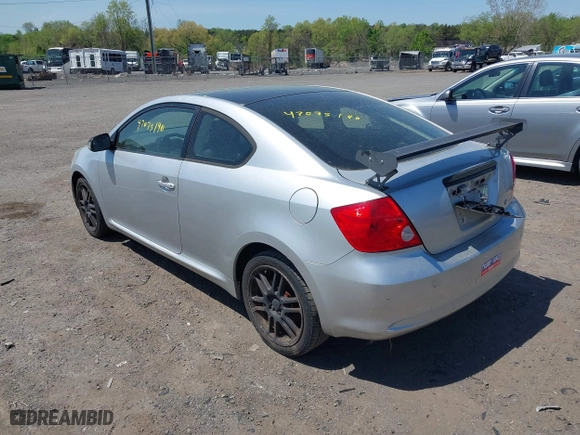 2006 Scion tC with VIN JTKDE177060139123, listed as a IAAI auction lot 42075140 with 218,391 mi miles. Bid and sale history available at carsss.com. Image 3.