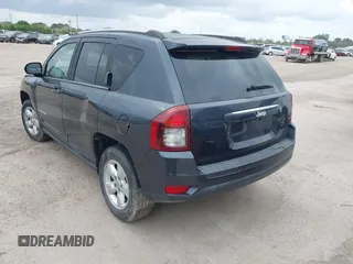 2014 Jeep Compass Sport with VIN 1C4NJCBA7ED882522, listed as a IAAI auction lot 42122474 with 187,157 mi miles and . Bid and sale history available at DreamBid. Image 3.