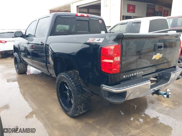 2015 Chevrolet Silverado 1500 LT with VIN 3GCUKREH8FG239959, listed as a IAAI auction lot 41483334 with 180,739 mi miles. Bid and sale history available at carsss.com. Image 3.