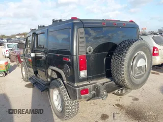 2006 Hummer H2 with VIN 5GRGN23U96H116719, listed as a IAAI auction lot 41781406 with 175,118 mi miles. Bid and sale history available at carsss.com. Image 3.