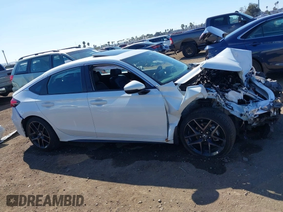 2024 Honda Civic Sport Touring z VIN 19XFL1G84RE029704, wystawiony jako IAAI lot #41659889 z przebiegiem Nie podano mil oraz . Historia ofert i sprzedaży dostępna na DreamBid. Obrazek 13.