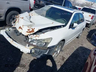 2005 Honda Accord EX z VIN 1HGCM56745A129381, wystawiony jako IAAI lot #41707363 z przebiegiem 148 356 mil mil oraz . Historia ofert i sprzedaży dostępna na DreamBid. Obrazek 2.