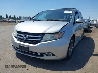2014 Honda Odyssey Touring with VIN 5FNRL5H91EB068427, listed as a IAAI auction lot 42163315 with 184,134 mi miles and . Bid and sale history available at DreamBid. Image 23.