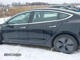 2018 Tesla Model 3 Long Range Battery with VIN 5YJ3E1EA2JF071855, listed as a IAAI auction lot 41314974 with 169,318 mi miles and . Bid and sale history available at DreamBid. Image 14.