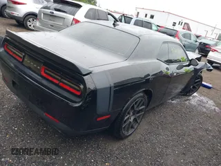 2016 Dodge Challenger R/T Scat Pack with VIN 2C3CDZFJ1GH265333, listed as a IAAI auction lot 42205764 with 68,195 mi miles and . Bid and sale history available at DreamBid. Image 4.