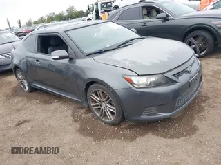 2012 Scion tC z VIN JTKJF5C74C3040019, wystawiony jako IAAI lot #42418457 z przebiegiem 160 579 mil mil oraz . Historia ofert i sprzedaży dostępna na DreamBid. Obrazek 1.