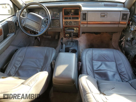 1994 Jeep Grand Cherokee Limited with VIN 1J4GZ78S0RC357283, listed as a Copart auction lot 49236995 with 84,306 mi miles and Salvage title. Bid and sale history available at DreamBid. Image 8.