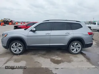 2021 Volkswagen Atlas SE с VIN 1V2JR2CA2MC539992, выставлен на аукционе IAAI как лот 42133933 с пробегом 82 287 миль миль и . История ставок и продаж доступна на DreamBid. Изображение 14.