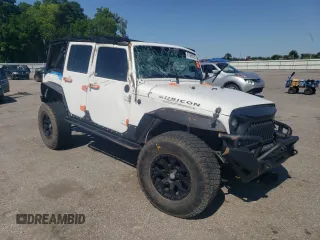 2014 Jeep Wrangler Unlimited Rubicon with VIN 1C4BJWFG4EL325544, listed as a Copart auction lot 61966025 with 149,162 mi miles and Salvage title. Bid and sale history available at DreamBid. Image 4.