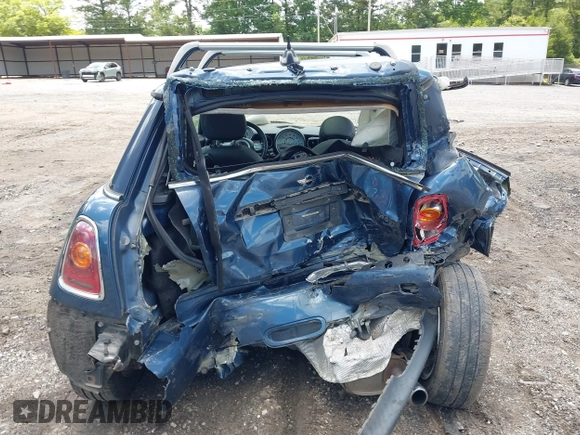 2009 MINI Hardtop with VIN WMWMF33509TU74290, listed as a IAAI auction lot 42538919 with 104,209 mi miles and . Bid and sale history available at DreamBid. Image 16.