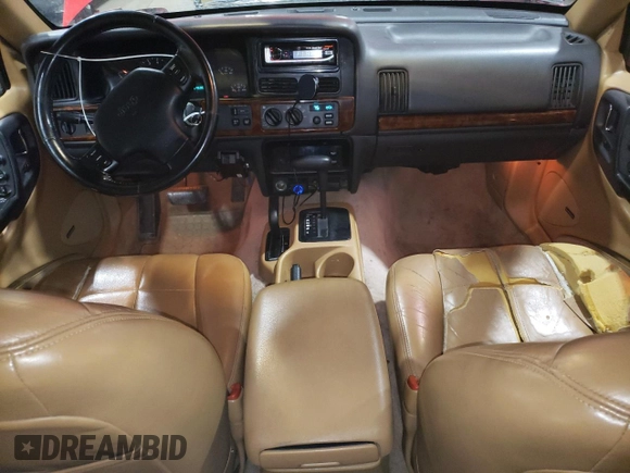 1996 Jeep Grand Cherokee Limited with VIN 1J4GZ78Y3TC186413, listed as a Copart auction lot 82370854 with 261,630 mi miles and Salvage Title. Bid and sale history available at carsss.com. Image 8.