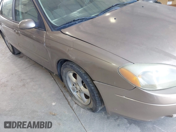 2002 Ford Taurus SES Standard with VIN 1FAFP55U32A171004, listed as a IAAI auction lot 41782261 with 105,967 mi miles. Bid and sale history available at carsss.com. Image 6.