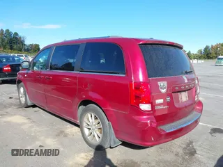 2014 Dodge Grand Caravan SXT with VIN 2C4RDGCG8ER311850, listed as a IAAI auction lot 40598088 with 138,010 mi miles and . Bid and sale history available at DreamBid. Image 3.
