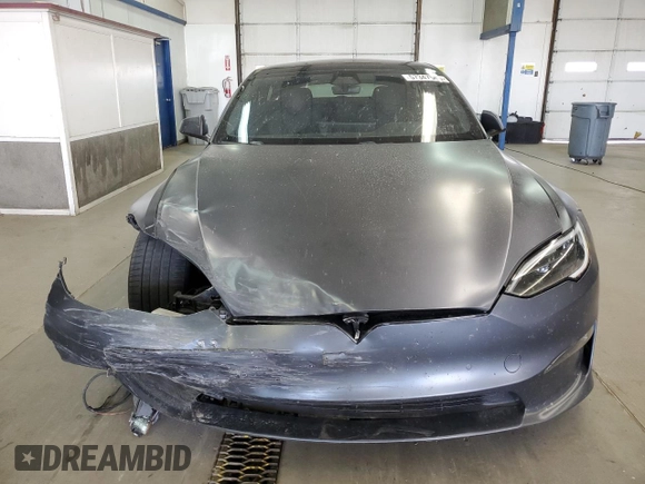 2022 Tesla Model S с VIN 5YJSA1E5XNF488415, выставлен на аукционе Copart как лот 57347565 с пробегом 18 662 миль миль и Списание • Salvage title. История ставок и продаж доступна на DreamBid. Изображение 5.