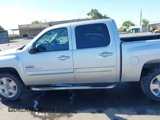 2010 Chevrolet Silverado 1500 LT with VIN 3GCRCSE02AG163989, listed as a IAAI auction lot 42111090 with 158,921 mi miles and . Bid and sale history available at DreamBid. Image 15.