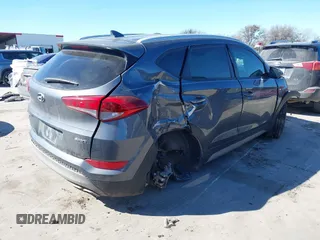 2018 Hyundai Tucson Sport with VIN KM8J33AL5JU770092, listed as a IAAI auction lot 41395349 with 101,395 mi miles. Bid and sale history available at carsss.com. Image 4.