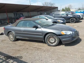 2004 Chrysler Sebring LXi z VIN 1C3EL55R54N391404, wystawiony jako IAAI lot #42051873 z przebiegiem 126 918 mil mil oraz . Historia ofert i sprzedaży dostępna na DreamBid. Obrazek 13.