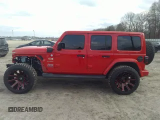 2022 Jeep Wrangler Unlimited Sahara with VIN 1C4JJXP62NW136932, listed as a IAAI auction lot 41486025 with 36,986 mi miles and . Bid and sale history available at DreamBid. Image 15.