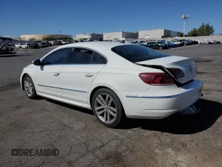 2014 Volkswagen CC R-Line with VIN WVWBN7AN0EE535837, listed as a Copart auction lot 68232344 with 118,001 mi miles and Salvage Title. Bid and sale history available at carsss.com. Image 2.