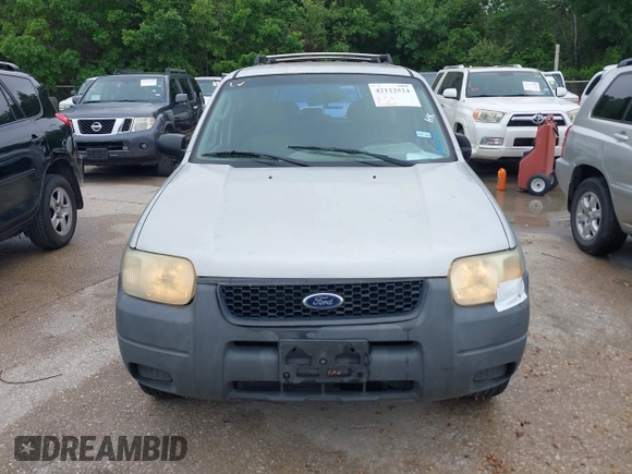 2003 Ford Escape XLS Popular with VIN 1FMYU02123KA32790, listed as a IAAI auction lot 42122524 with 244,560 mi miles and . Bid and sale history available at DreamBid. Image 6.