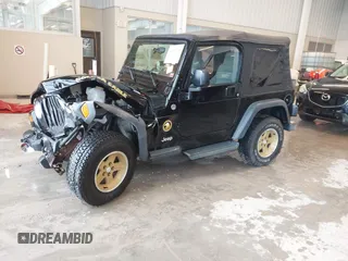 2006 Jeep Wrangler Sport with VIN 1J4FA49S96P733712, listed as a IAAI auction lot 41572913 with 93,511 mi miles. Bid and sale history available at carsss.com. Image 2.